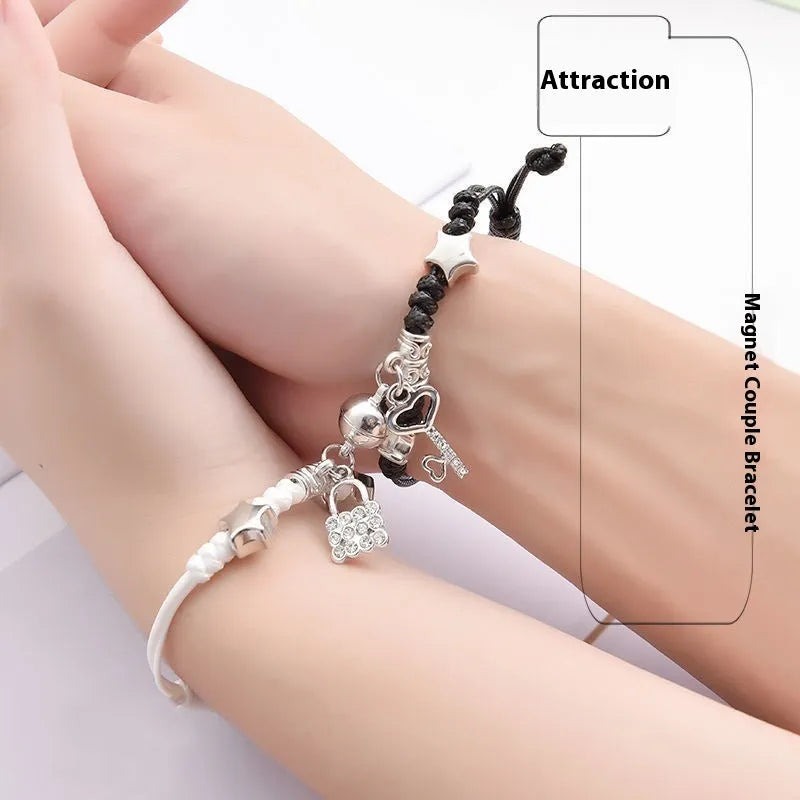 Magnetic couple bracelet set with electroplated alloy construction and various charm designs