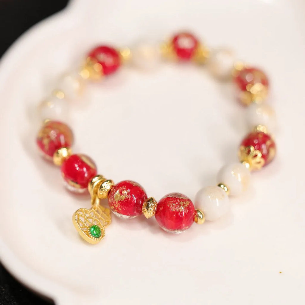Women's ethnic style geometric bracelet with gold foil coloured glaze in Xingshi design