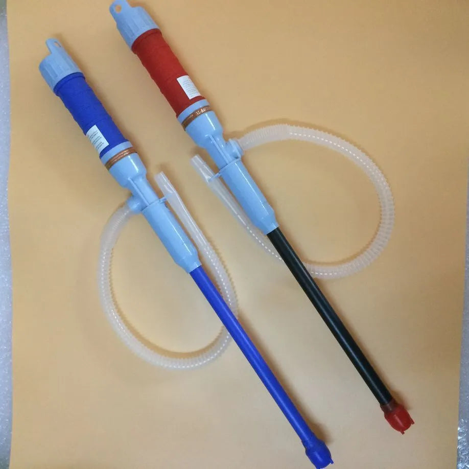 Blue and red manual hand siphon pump for fuel and liquid transfer