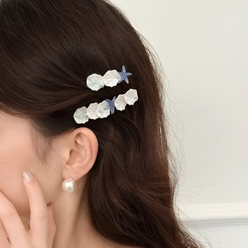 Starfish shell side bang clip barrette in short or long style with shell fishtail design
