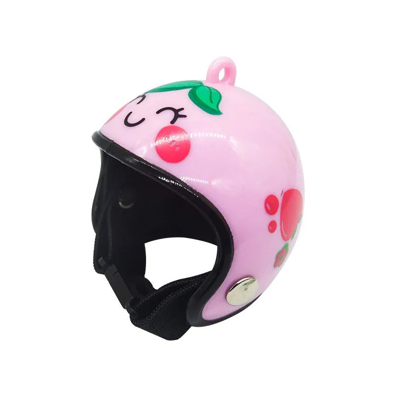 Small plastic chicken pet helmet in one of twelve designs including rainbow, plaid, or smiling face.