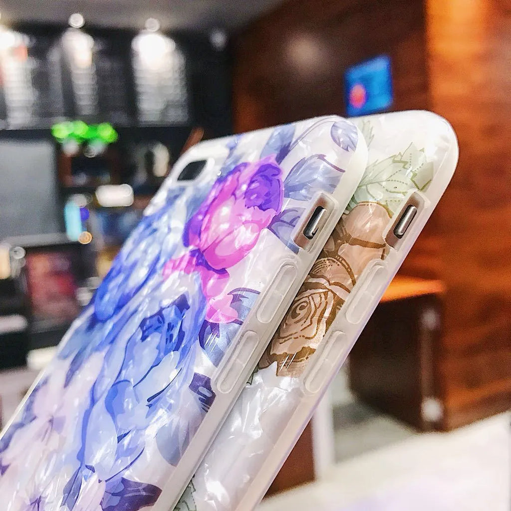 Dream Shell soft TPU iPhone case shown in brown, purple and white colours for multiple iPhone models.