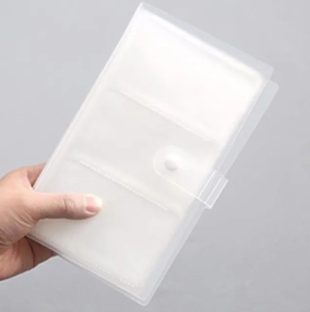 Blue PVC and PP business card holder book with protective shell, showing smile logo and insert slots.