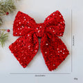25cm red paillette Christmas sequin bow pendant on white background