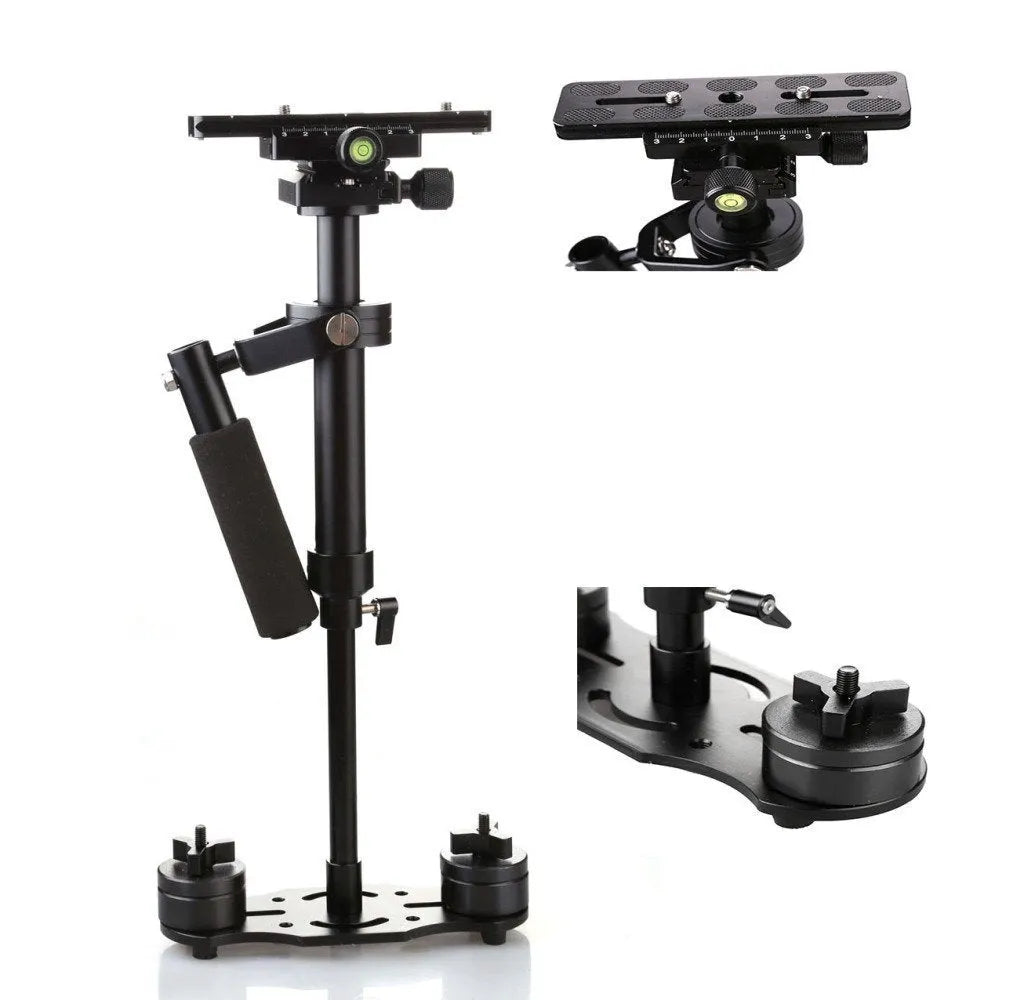 Black aluminium handheld camera stabilizer with adjustable height on a table.