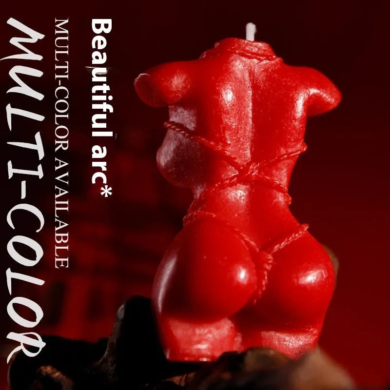 Soy wax low temperature novelty candle in a bikini shape, shown in rose red, spring pink, and lilac purple colours.