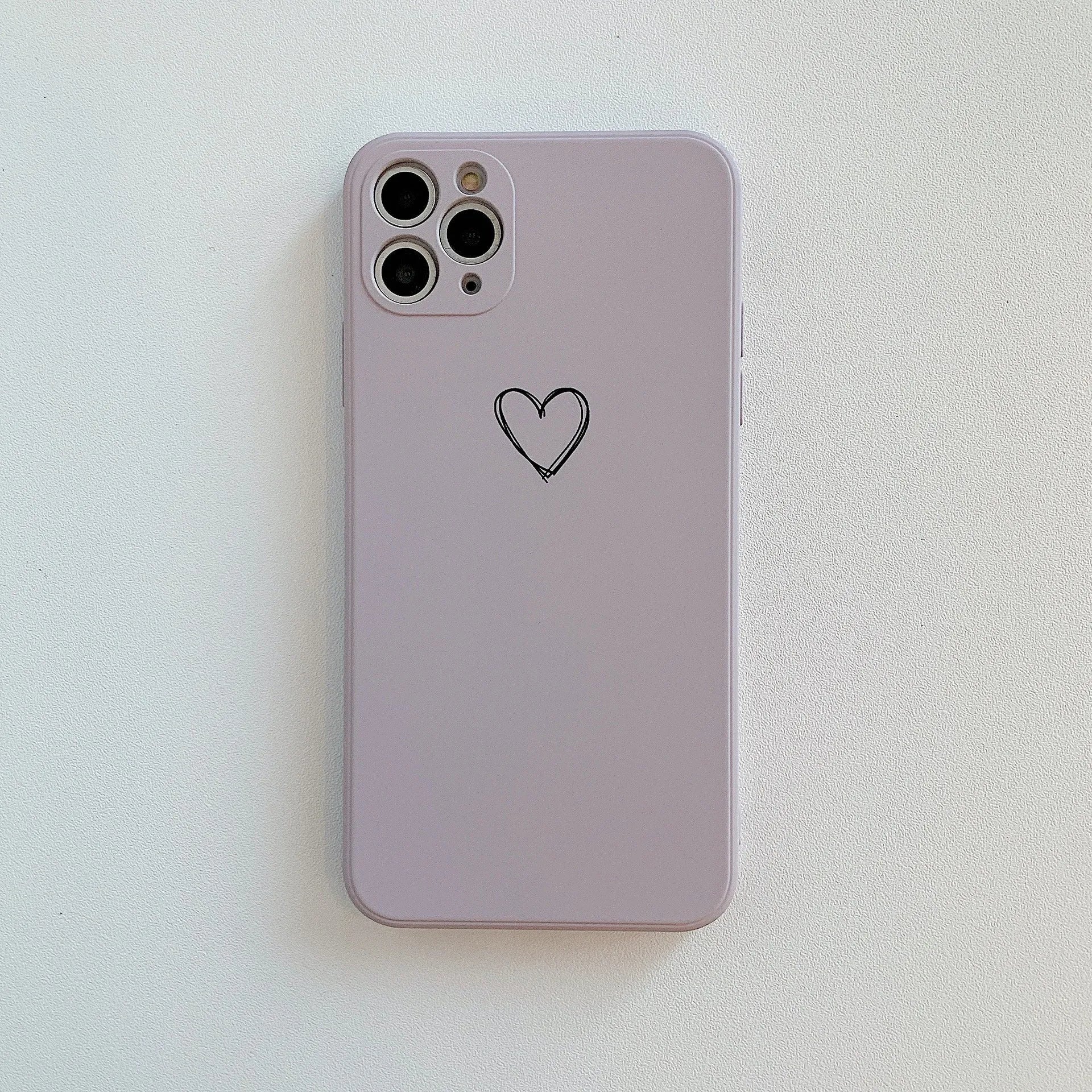 Solid colour silicone TPU phone case for Apple iPhone on a table