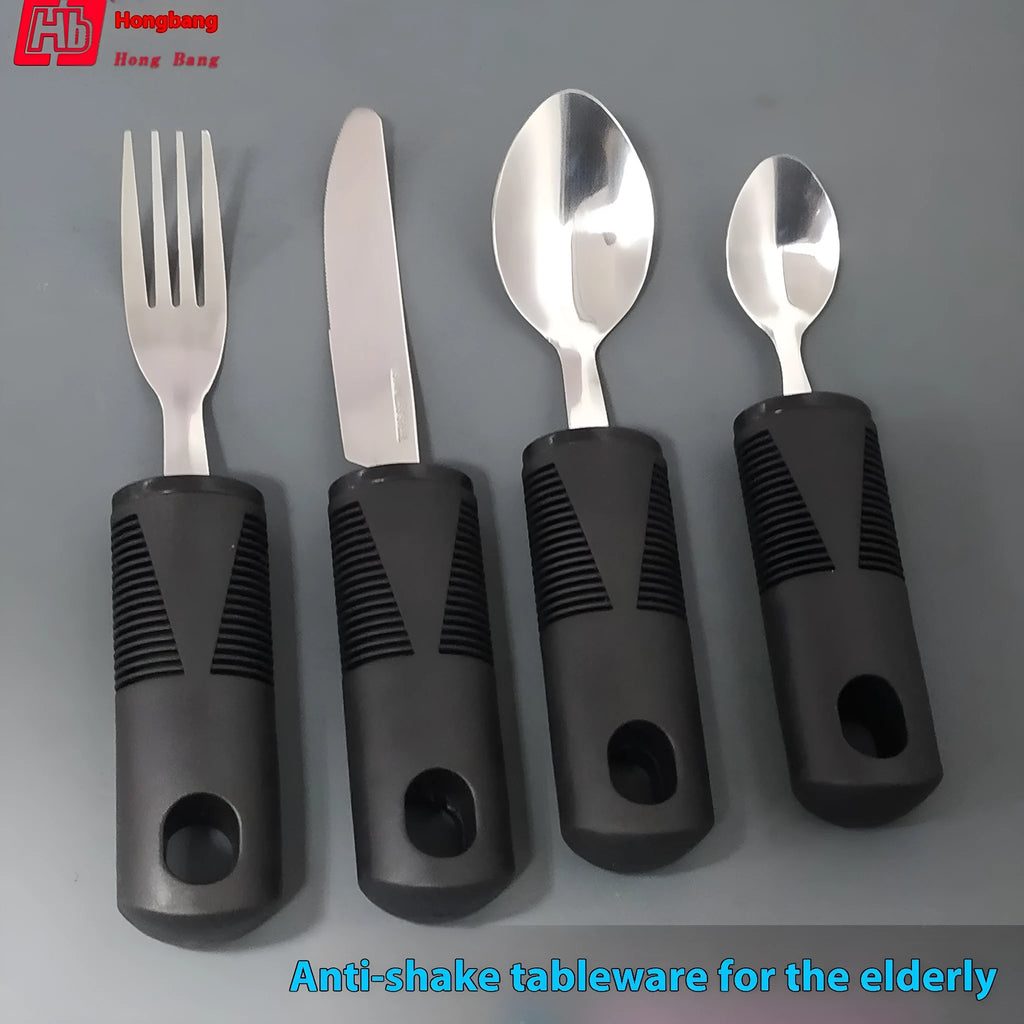 Stainless steel adaptive spoons and cutlery with black rubber handles for assisted eating.