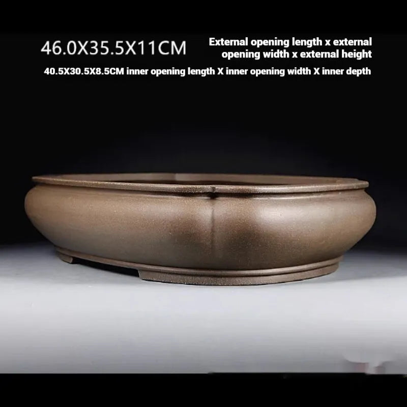 Handmade antique papaya-shaped purple clay flower pot for plants