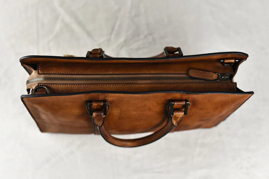 Men's brown leather business handbag with horizontal square design and zipper opening