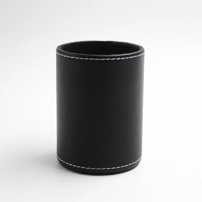 Small black leather round pen holder with 8cm diameter and 10.8cm height dimensions