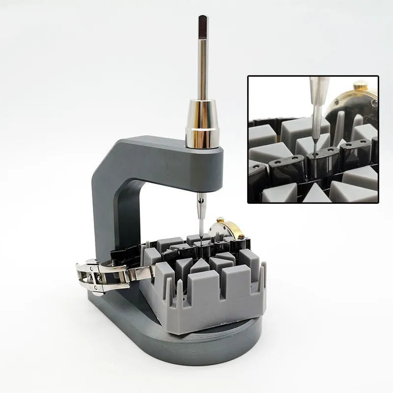 Silver-coloured tool steel press strap removal tool for watches and jewellery.