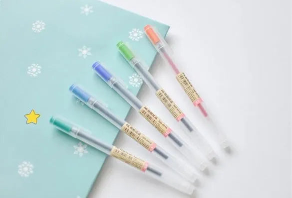 Muji 12-piece gel pen set with 0.5mm nibs and fine aqueous ink, shown in packaging.