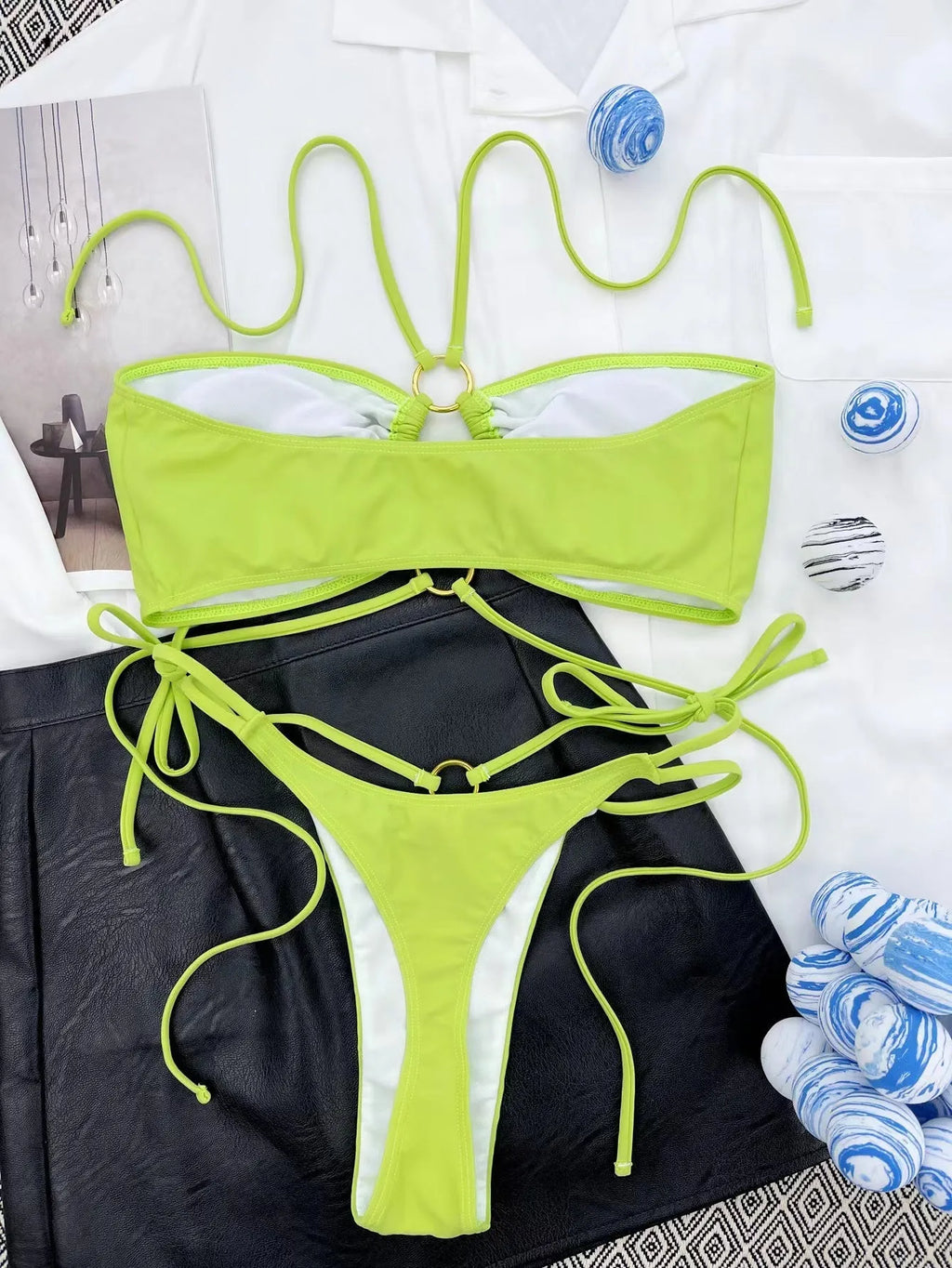 Yellow green women's lace-up triangle bikini swimsuit on white background