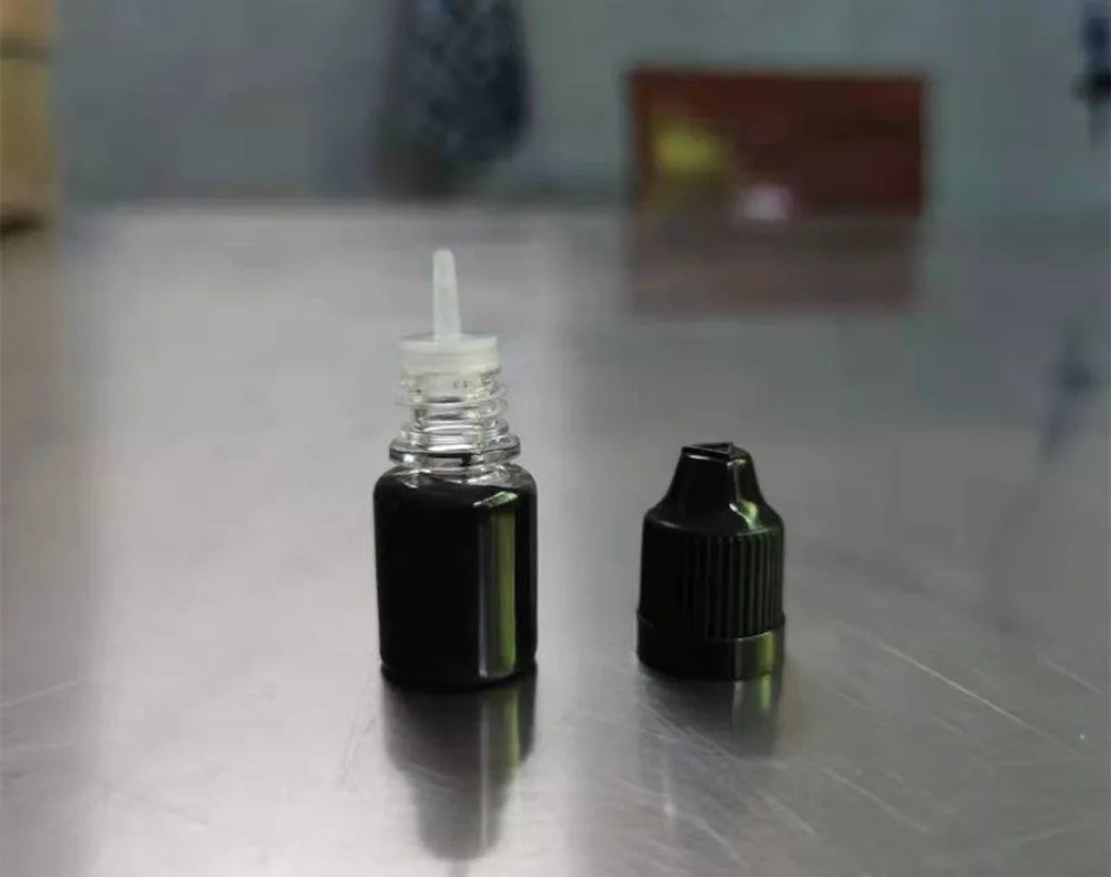 A 5ml bottle of black quick-dry confidentiality seal ink for security stamping.