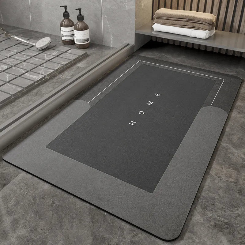 Cushioned bathroom floor mat with non-slip backing in blue colour showing oval shape on bathroom tiles