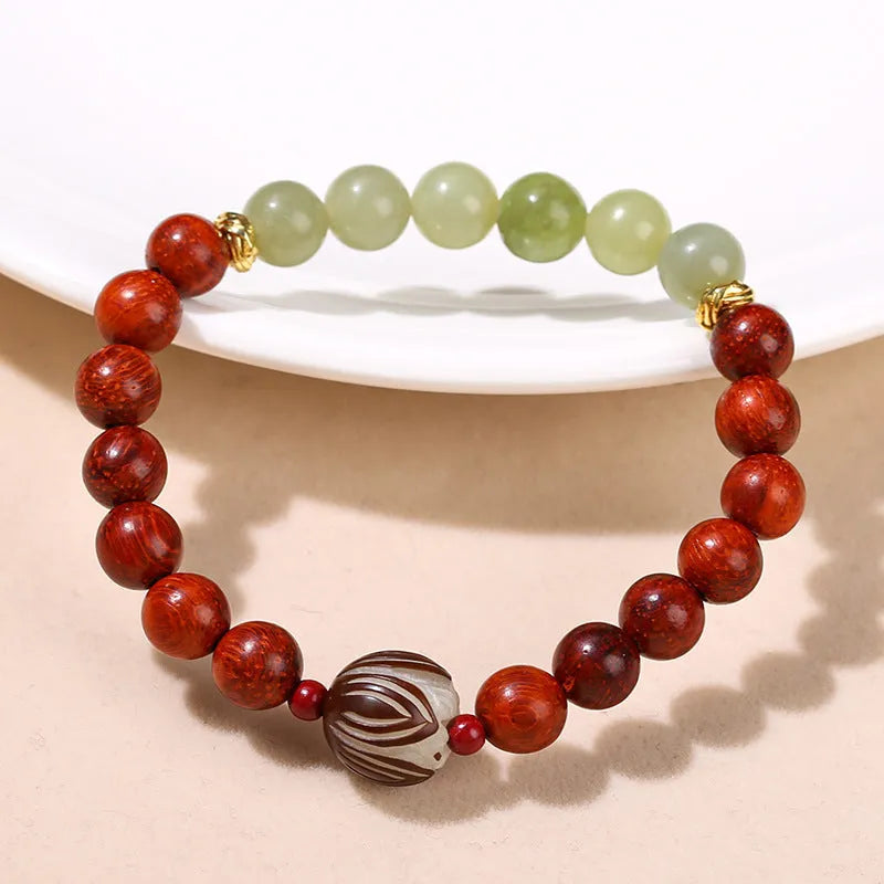 Red rosewood and gray jade Bodhi Lotus bracelet with geometric round beads.