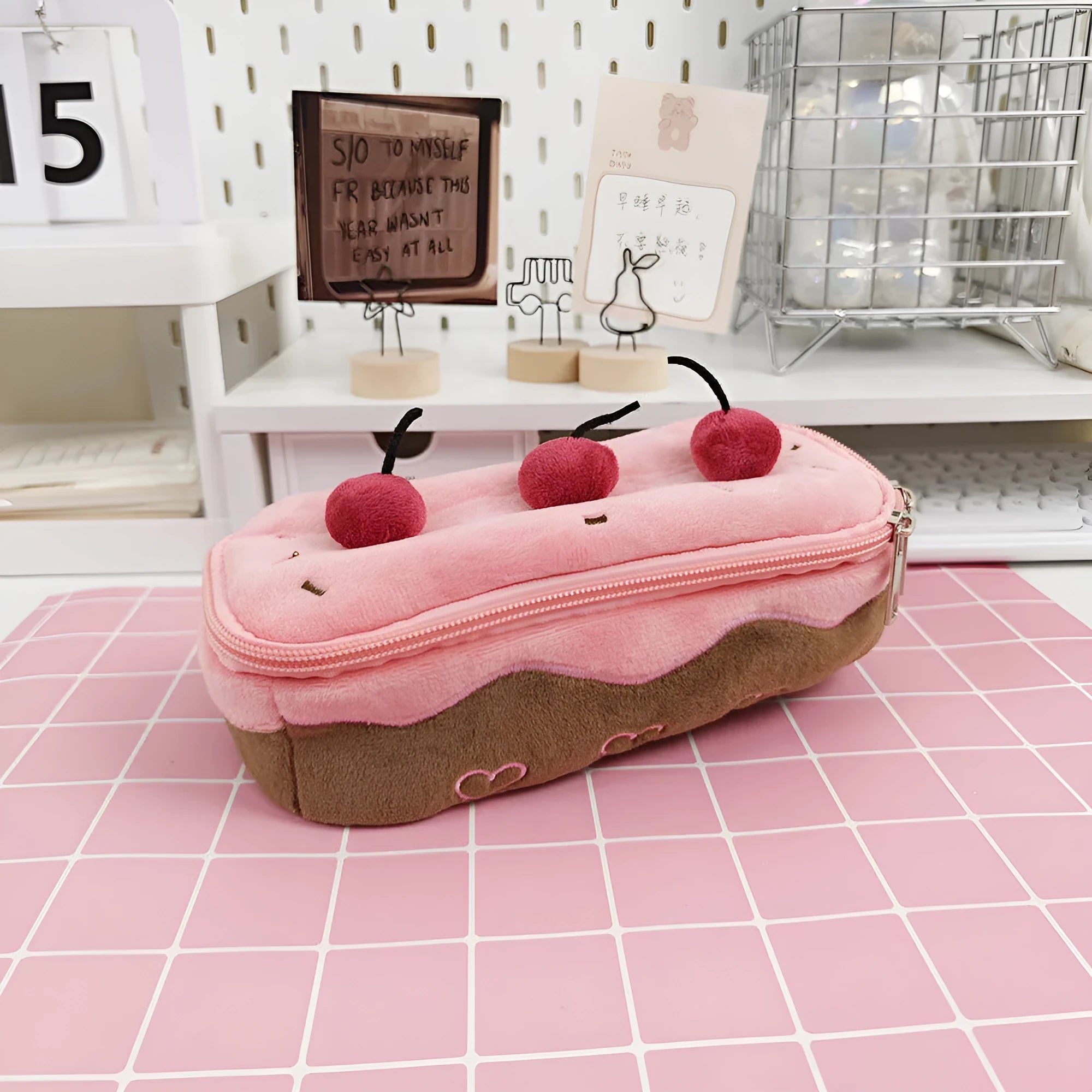 Cherry Cake coloured plush velvet pencil bag with a zip closure.