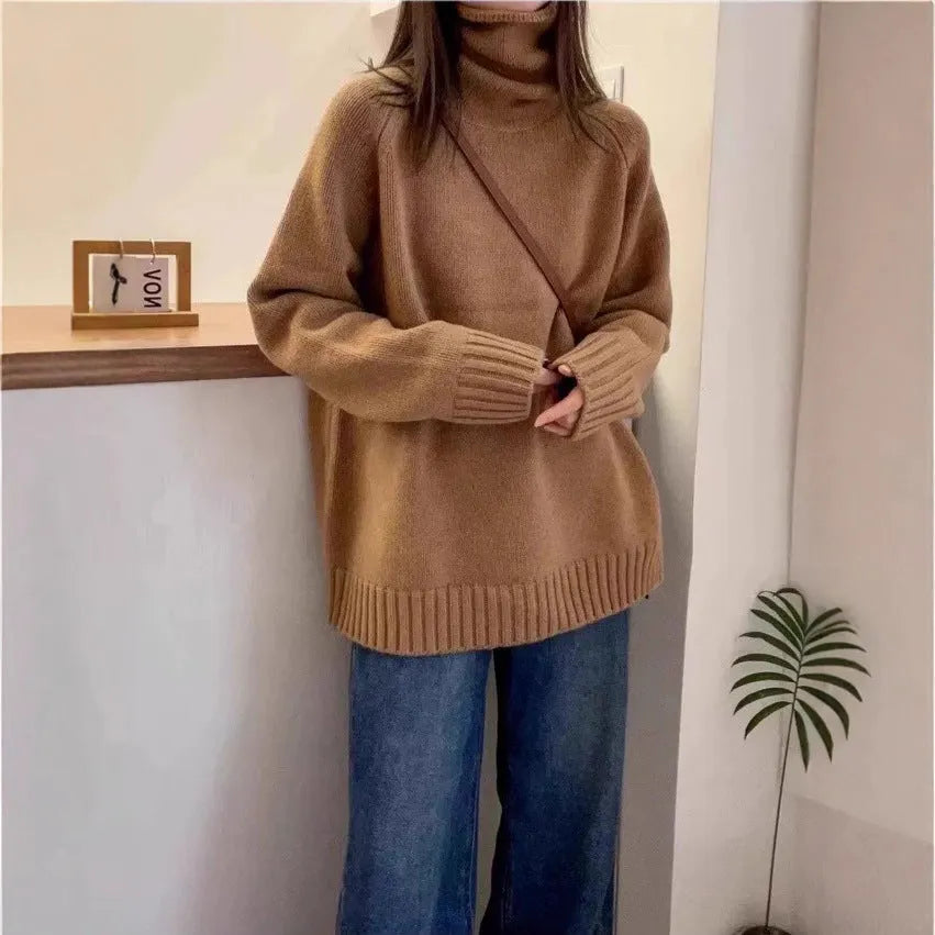 Loose red women's turtleneck sweater with thick curling collar, casual idle style.