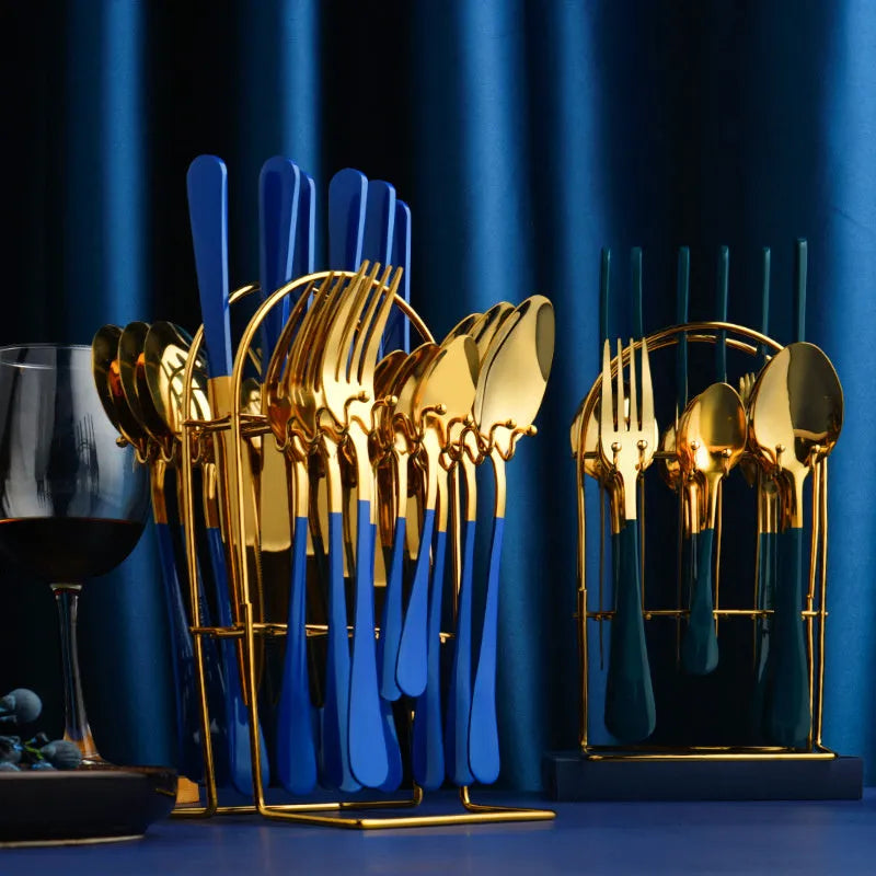 Gold stainless steel 24-piece cutlery set with knives, forks, spoons, tea spoons and a storage rack.