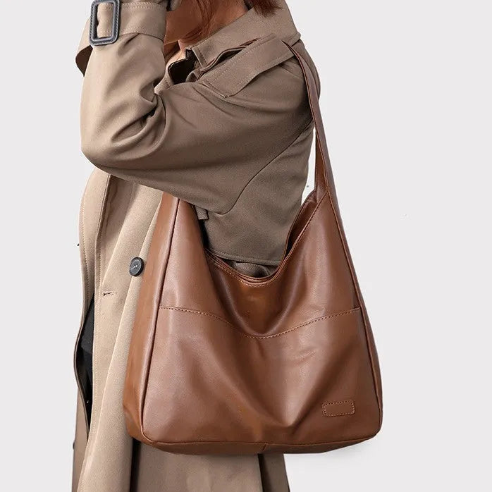 Women's soft PU leather shoulder bag in retro style with 32cm dimensions and open pocket design