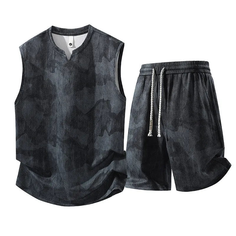 Men's black-blue sleeveless vest suit with matching fifth-length shorts on a hanger.