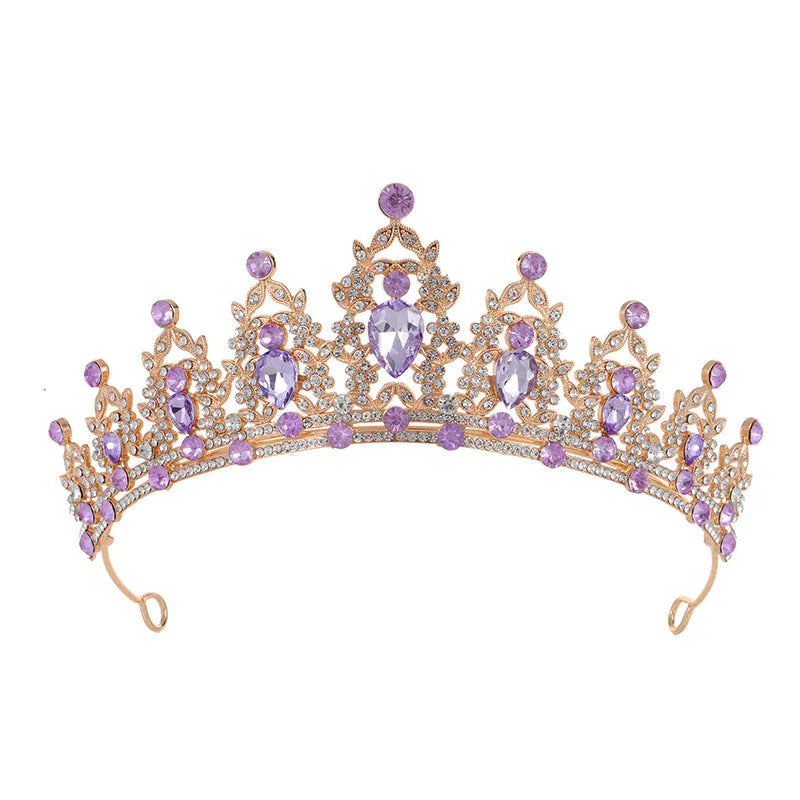A silver and rhinestone baroque bride crown headdress with intricate detailing on a white background.