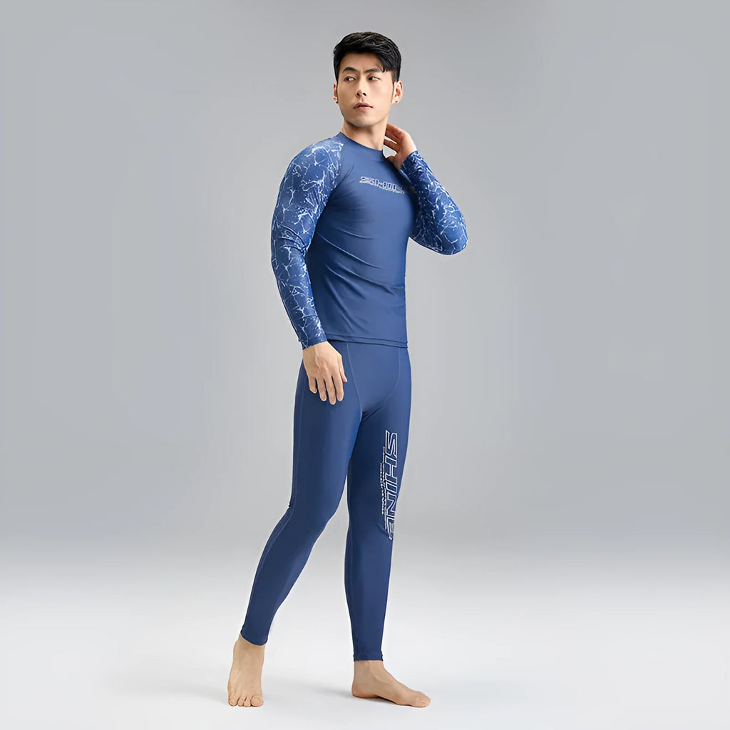 Men's dark blue patterned nylon swimwear set with top and shorts on size chart.