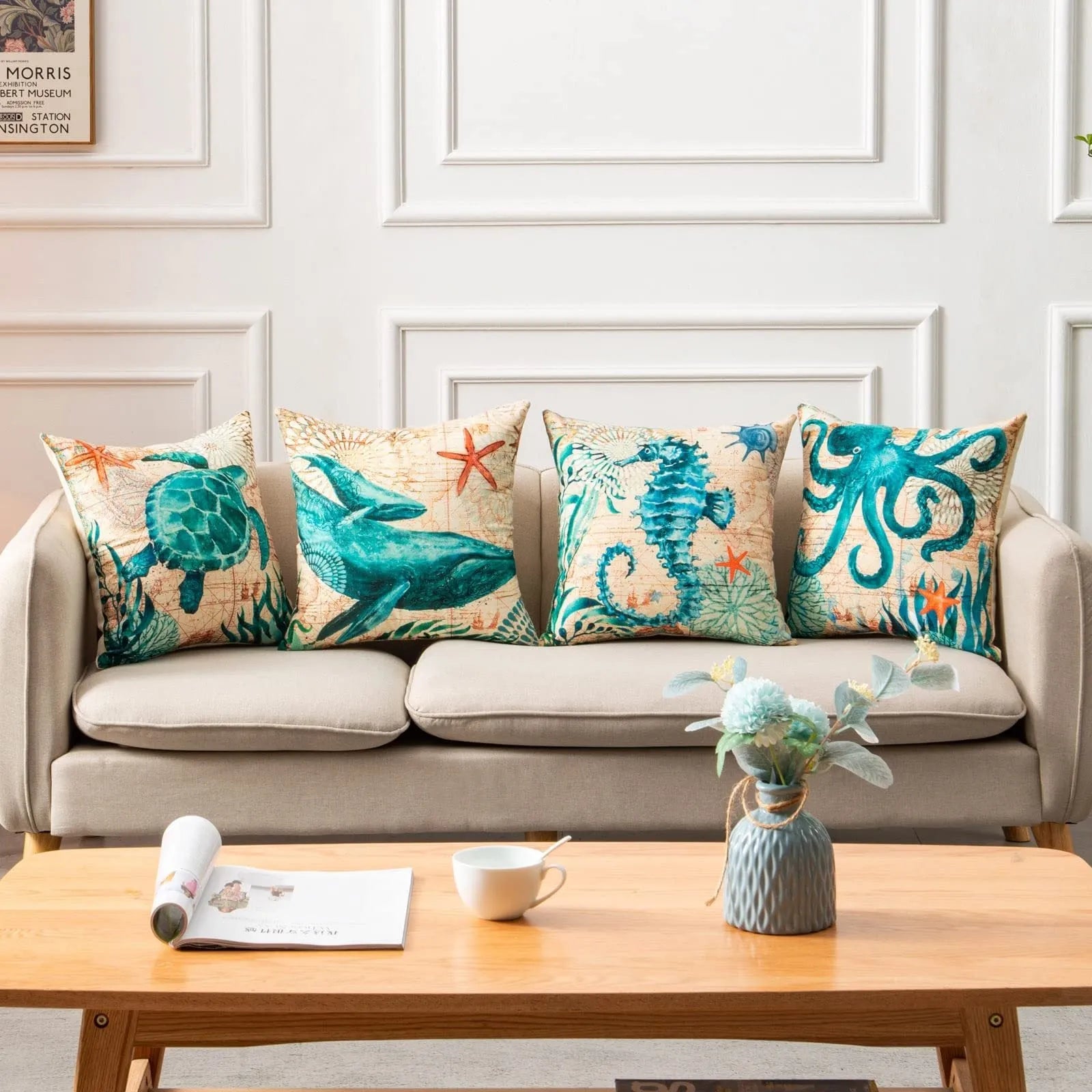 Linen cushion cover with detailed sea turtle print, measuring 45x45cm, on a sofa.