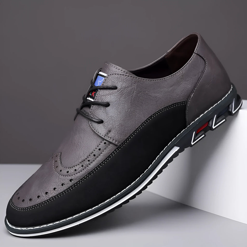 Men's black leather casual shoes with a rubber sole and sewn detail on the fabric upper.