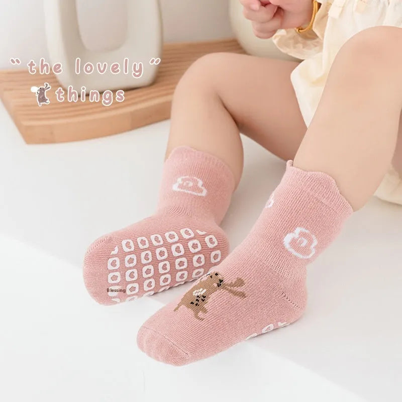 Cotton short tube socks in beige smiley face design for children - free size trampoline socks