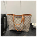 Western-style textured PU leather shoulder bag in black, shown with a 22.5cm strap.