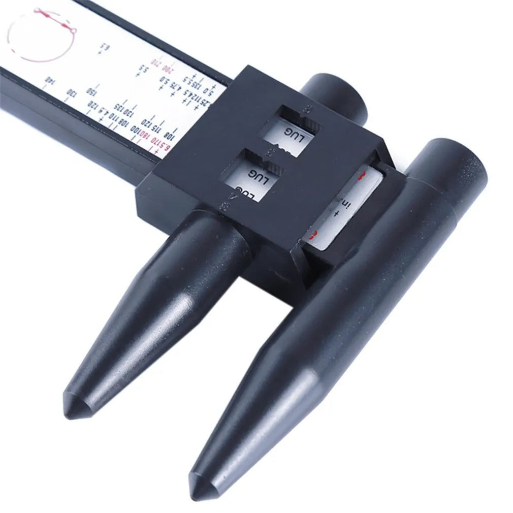 Electronic digital plastic caliper hole distance measuring tool on a plain background.
