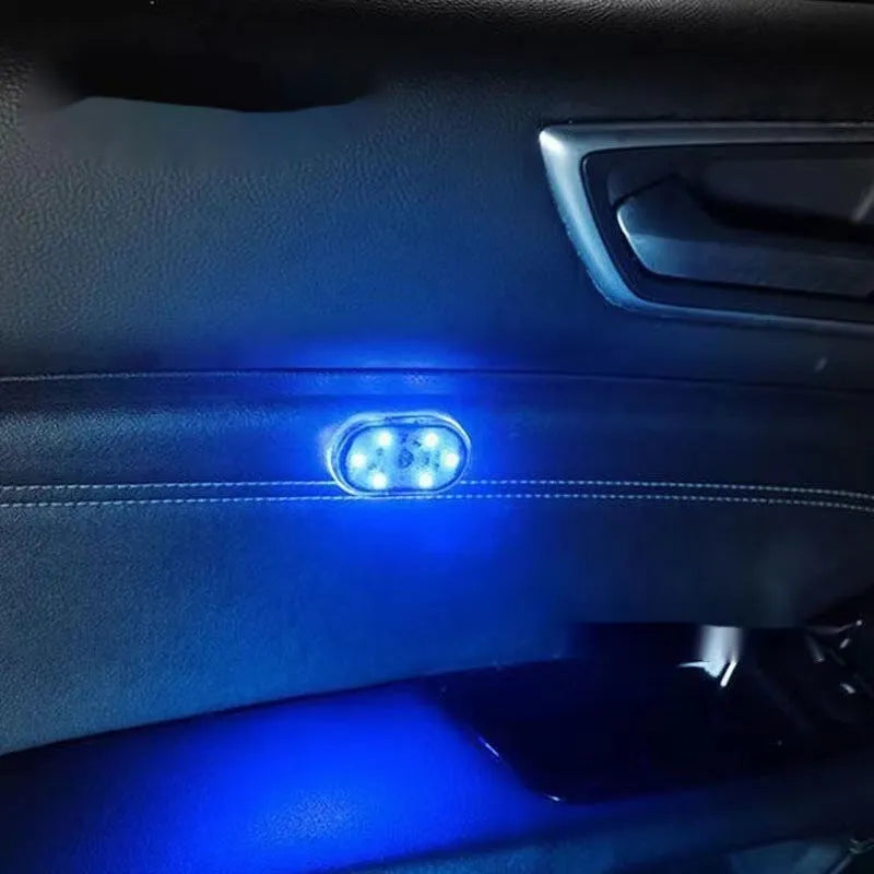 Car interior LED touch lamp with aluminium base plate, showing colour options: white, blue, ice blue, pink purple.