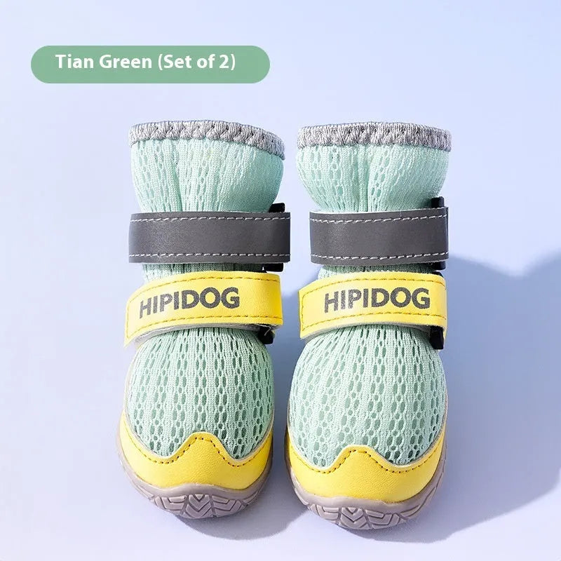 Pair of blue cartoon-style dog shoes with a wear-resistant sole for summer pavement protection.