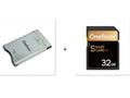 SD to PCMCIA adapter card with stainless steel housing and a 32GB SD card for Mercedes-Benz cars.