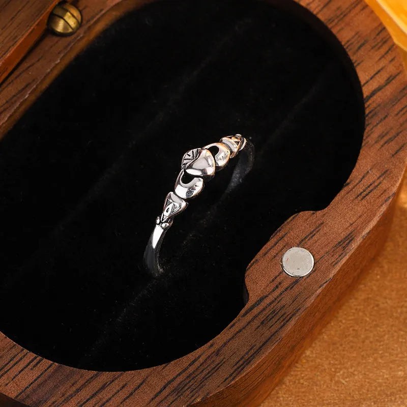Women's copper heart open ring with retro silver finish showing adjustable back design