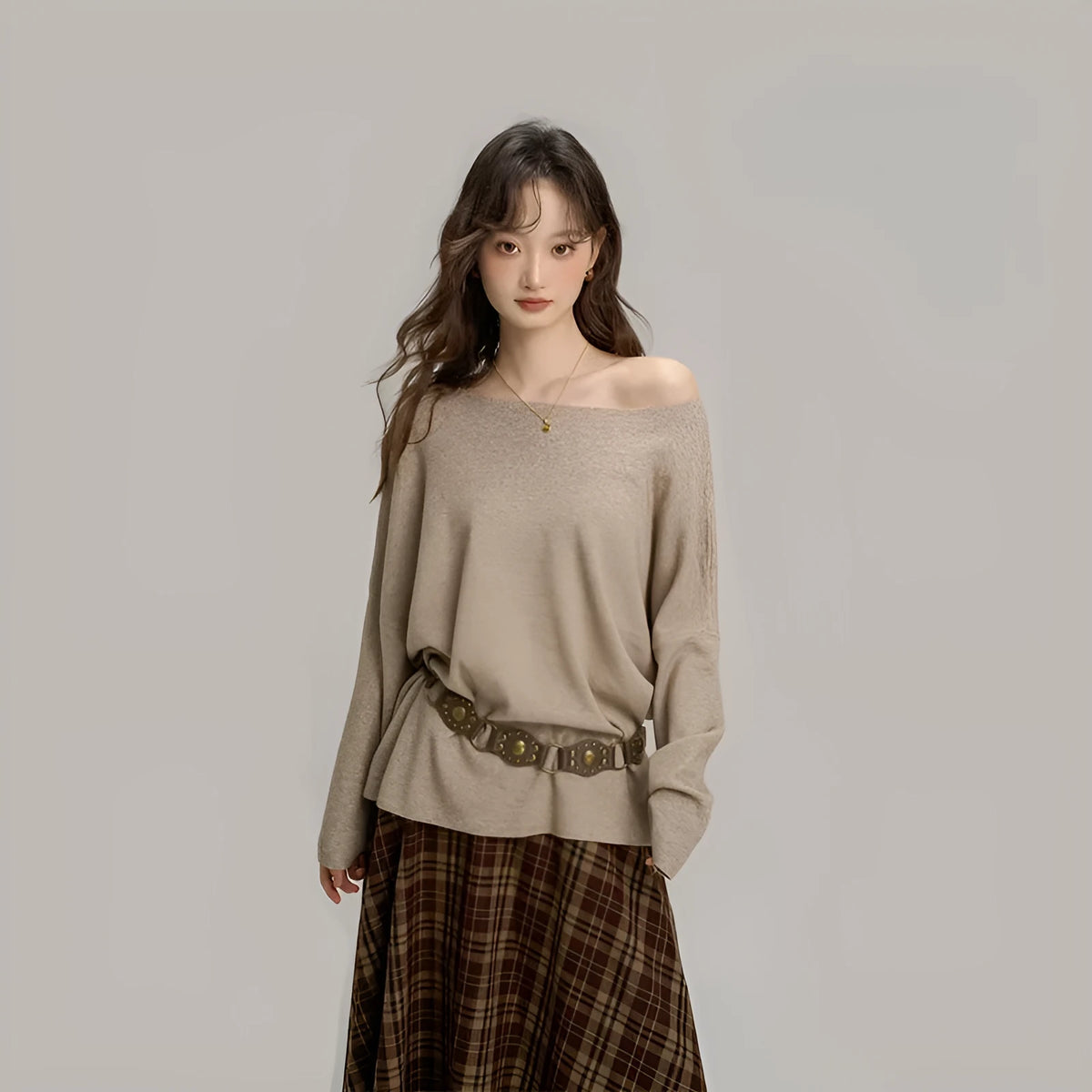Oblique shoulder soft knit top for women in oatmeal colour with collarbone reveal detail