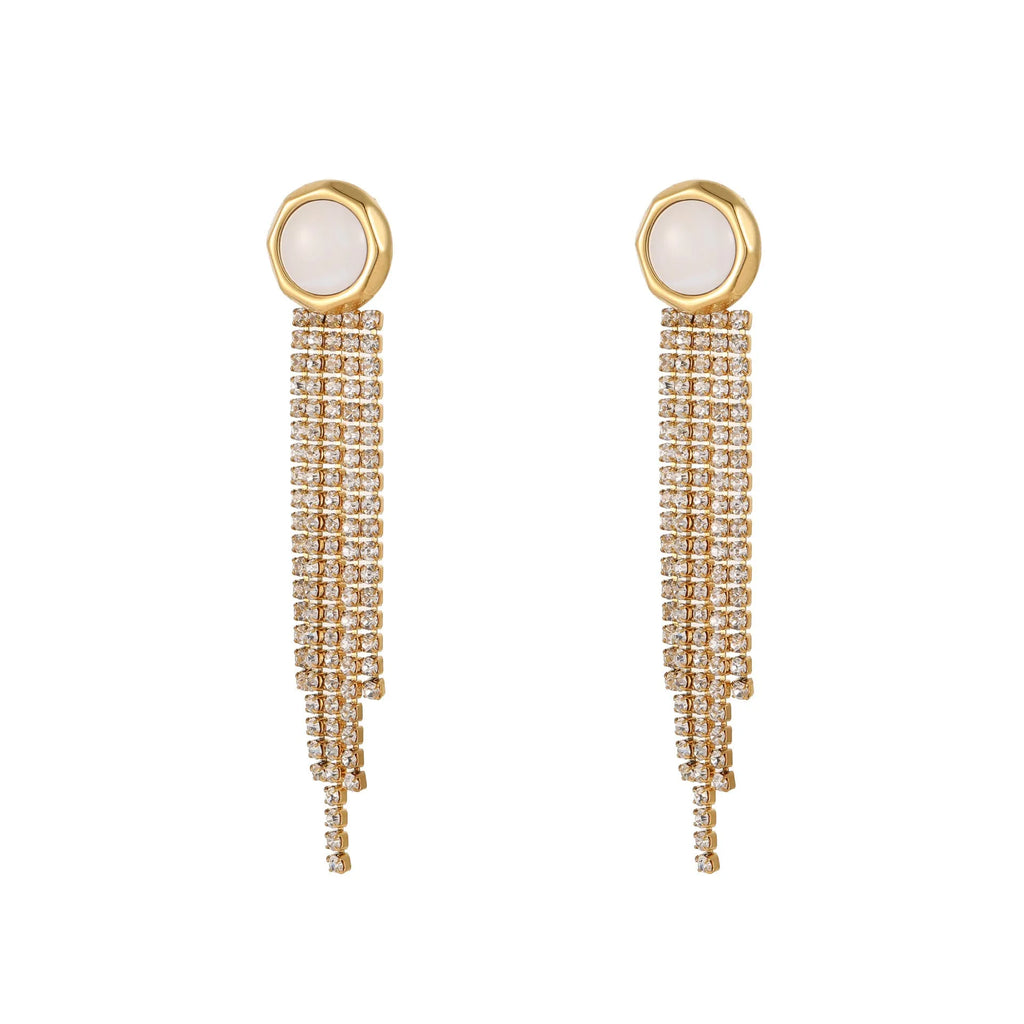 Close-up of a pair of gold plated stainless steel earrings featuring a heart shape design with diamond tassel and geometric star details.