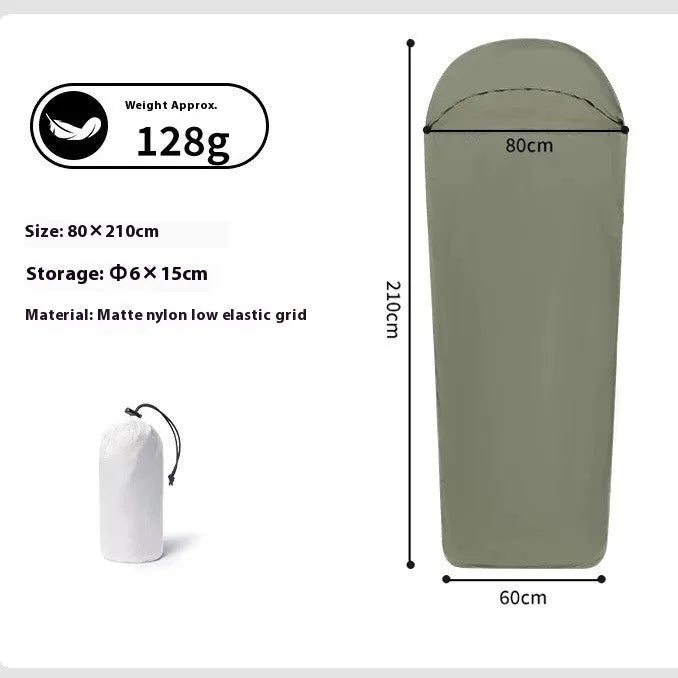 Blue mummy-style camping sleeping bag with tapered design on a green background.