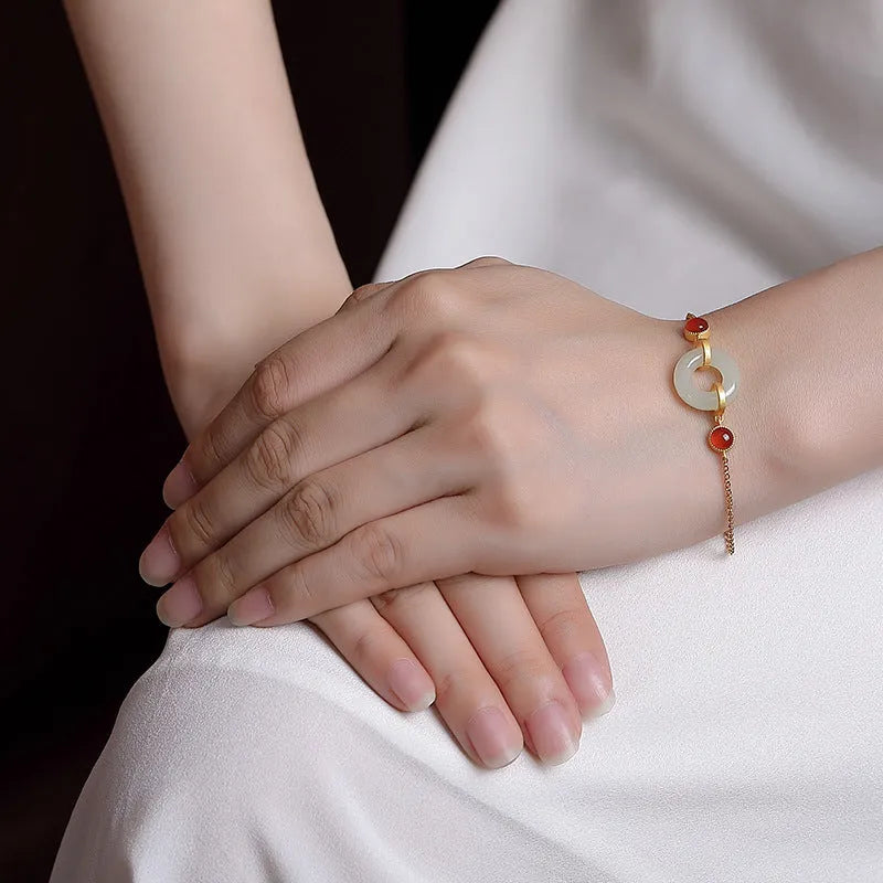 S925 sterling silver gold-plated bracelet with natural Hetian jade peace symbol buckle and adjustable clasp
