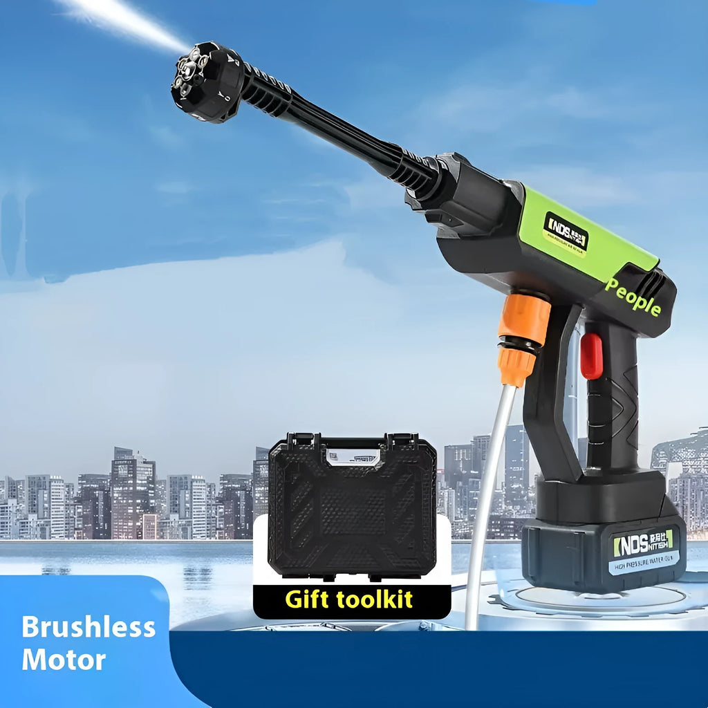 Green wireless high-pressure water gun with multiple nozzle attachments on a garden patio.