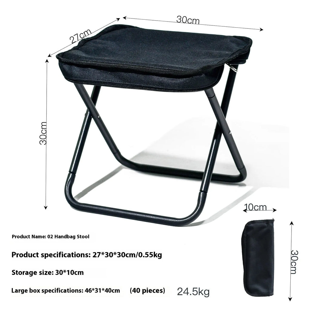 Lightweight foldable camp stool in khaki colour, shown folded flat in pencil box style.