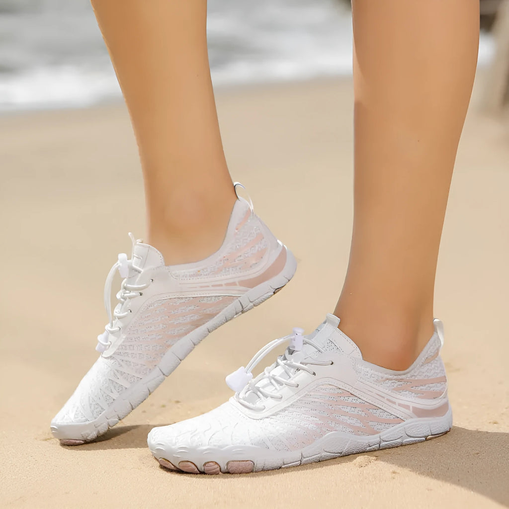 Unisex water shoes with non-slip rubber sole and Velcro closure in black and blue colour option