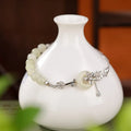Hetian jade lotus peace buckle women's bracelet in 925 silver with antique design
