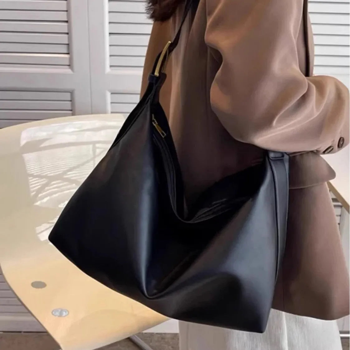 Soft collapse large capacity one shoulder PU tote bag, horizontal square shape, with stitching and contrast colour details, available in five colours including brown and black, 35x16.5x25cm.