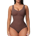 Green seamless nylon corset bodysuit for women on a hanger, showing its one-piece shaping design.