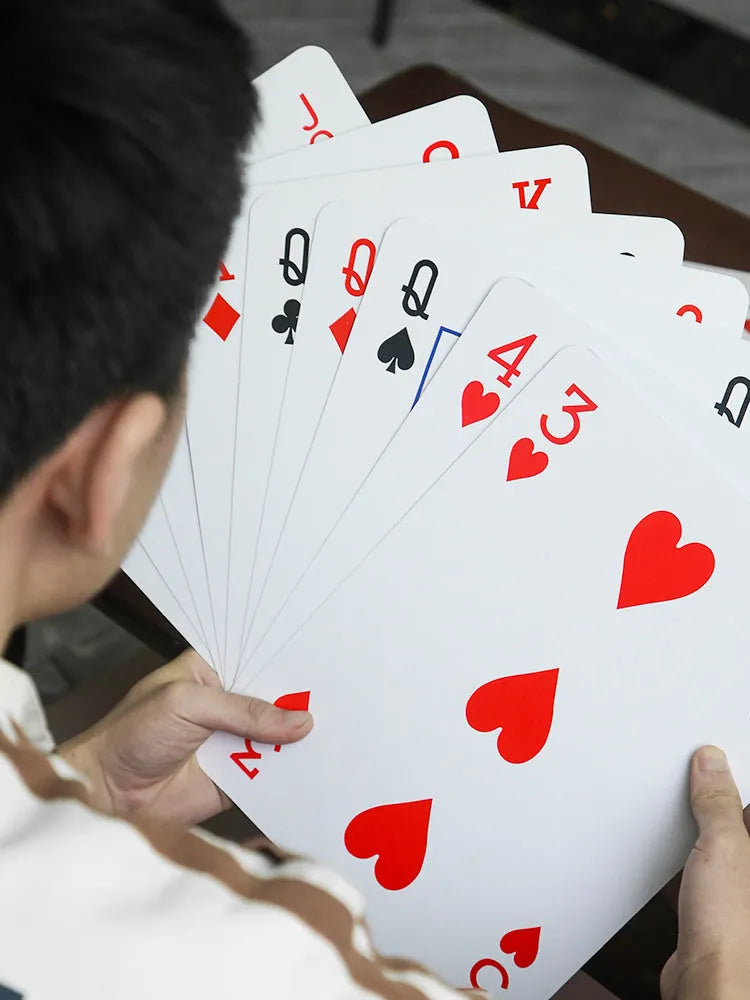 Jumbo playing cards in large size for table games with enhanced visibility