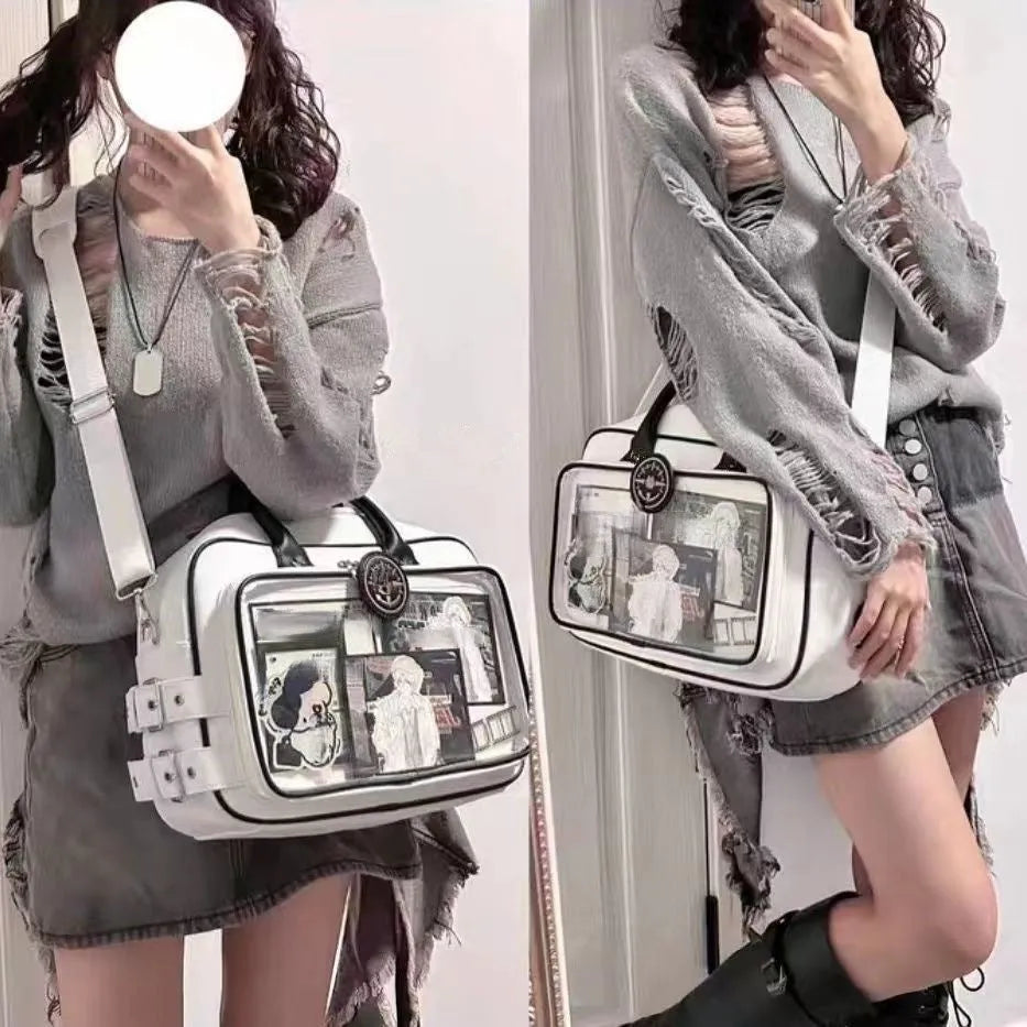 One-shoulder crossbody bag in PU, 42x24cm, white or black, with zipper change bag and outer pocket.