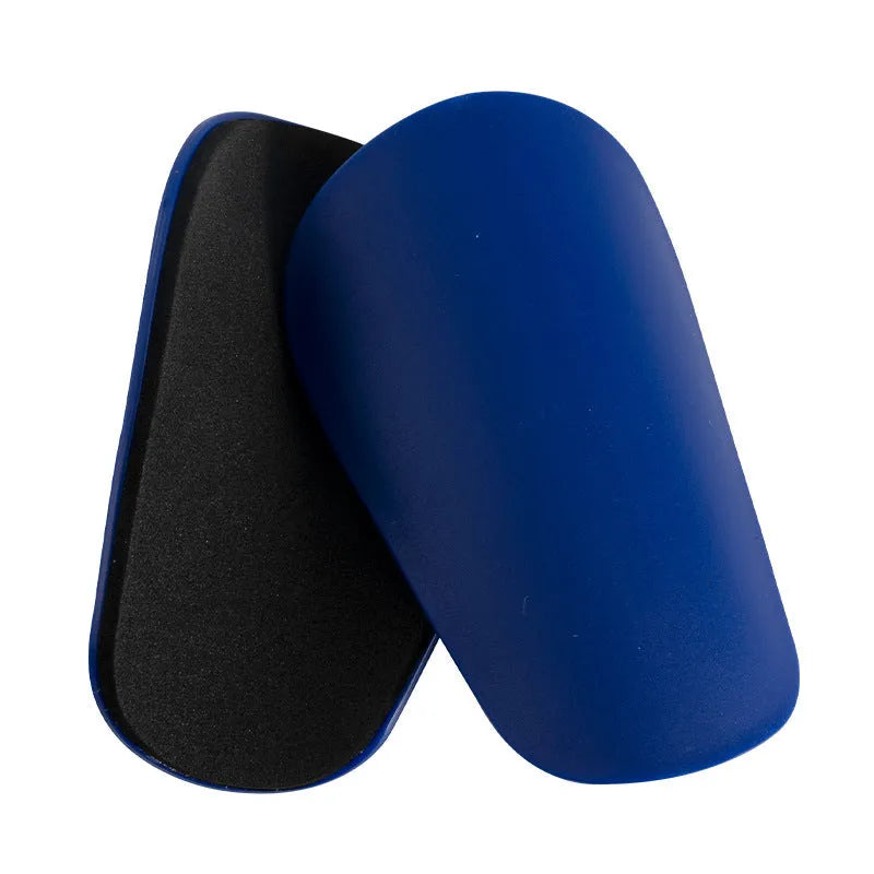 S size PU mini shin guards for sports, shown in black, white, red, and dream blue colours.